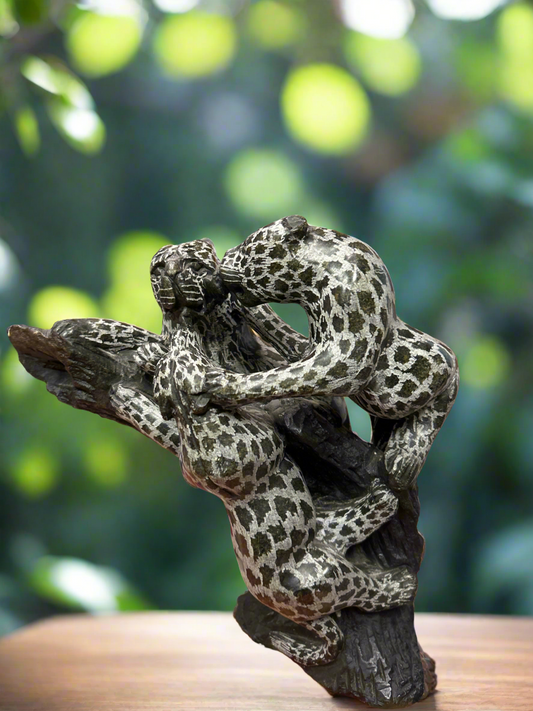 African Stone Crafted Leopards Feeding on a Stone Crafted African Tree