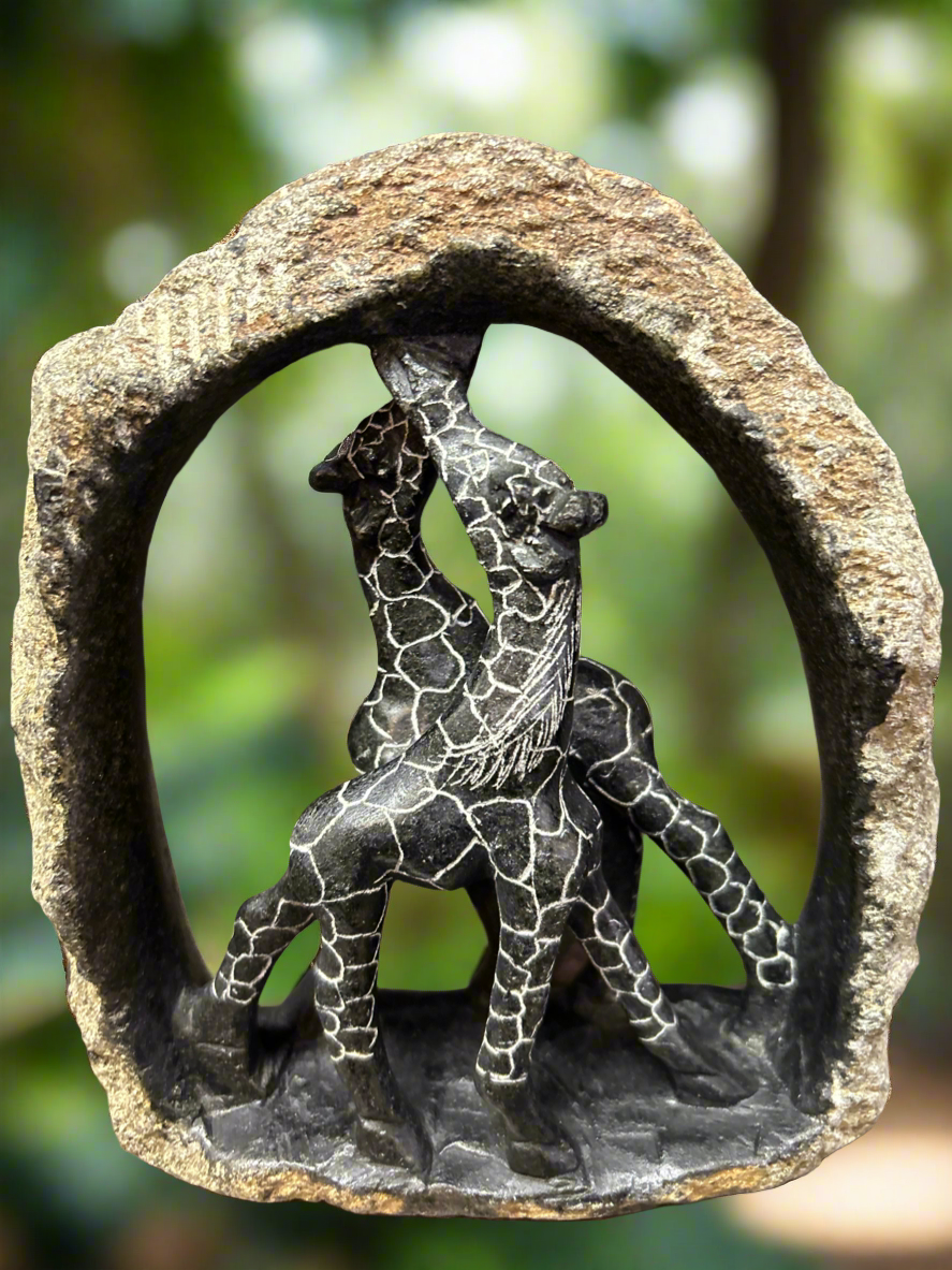 African Stone Crafted Giraffe Mates under Stone Crafted Shelter