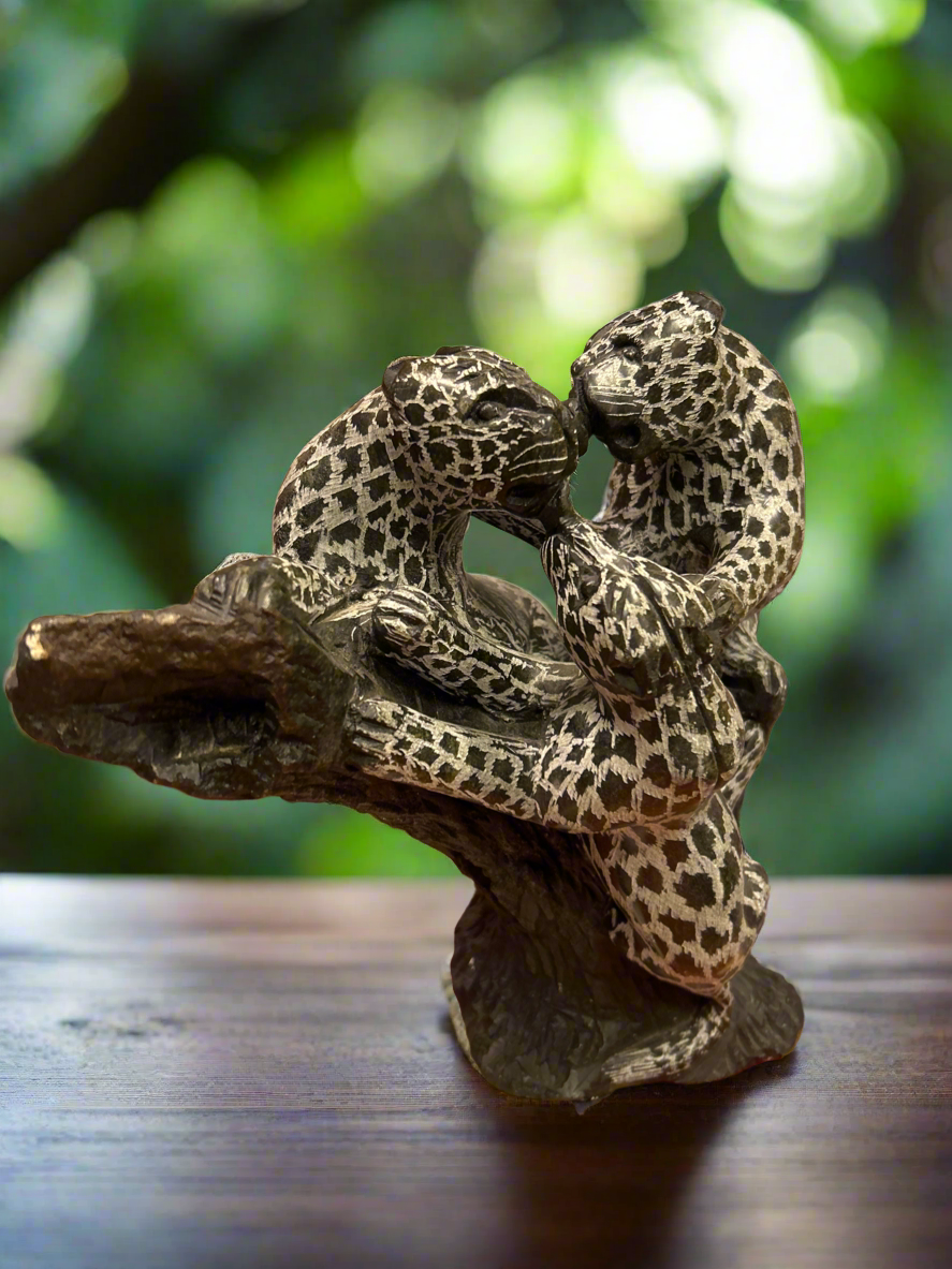 African Stone Crafted Leopards Feeding on a Stone Crafted African Tree