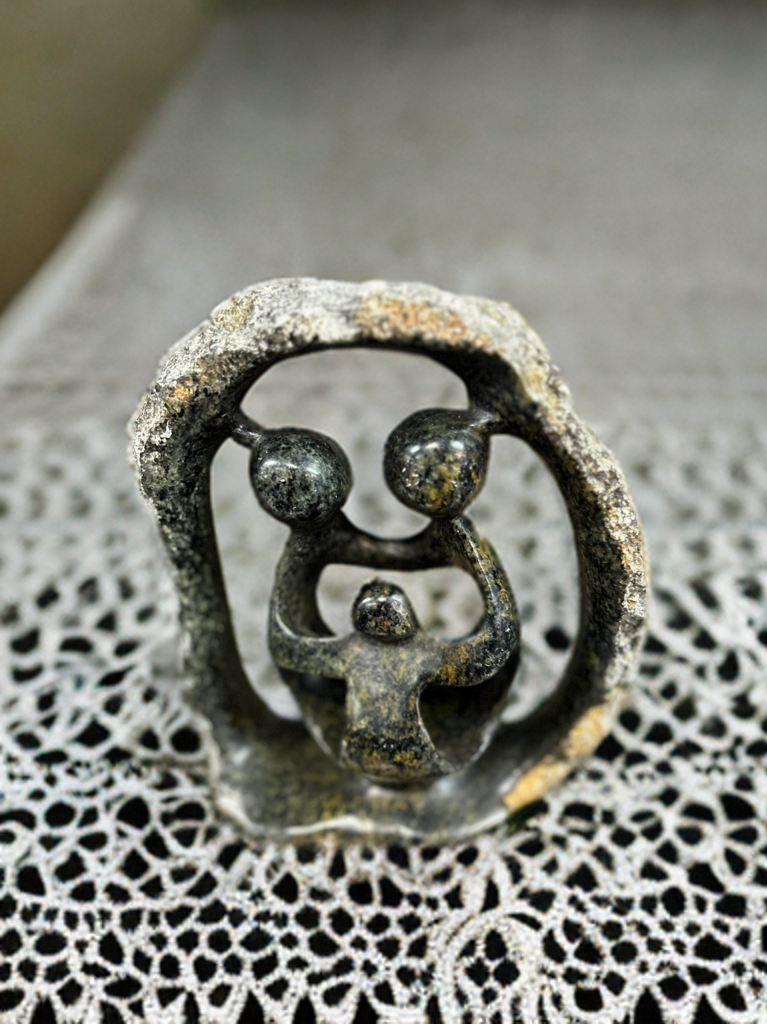 African Stone Family under Stone Shelter